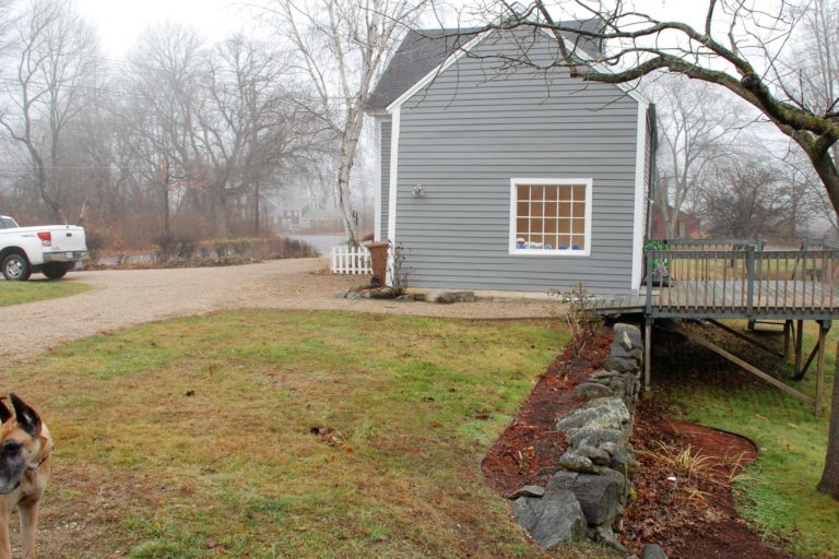 transformations - before - stone wall and deck